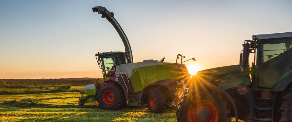 Tractors carry out contract farming