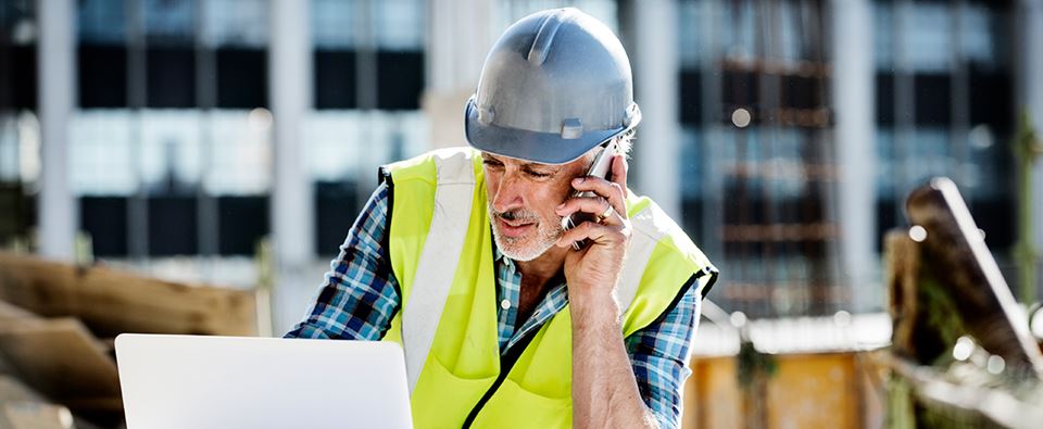 construction project owner on the phone