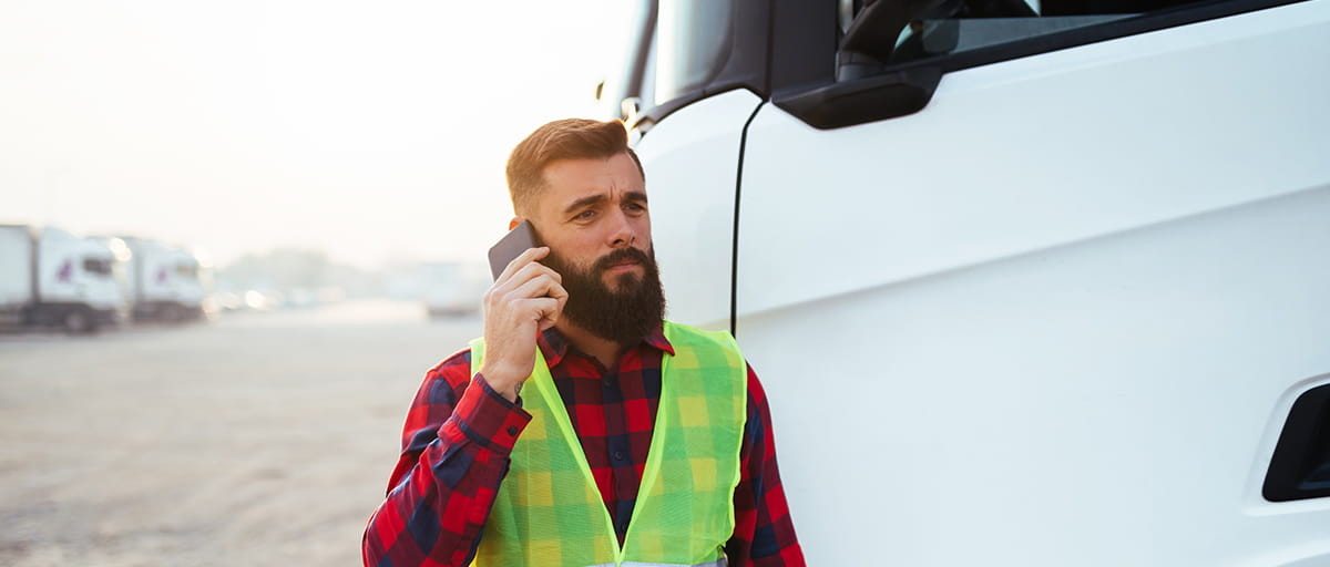 Concerned haulage owner on the phone
