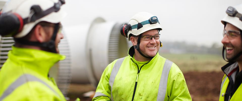 Renewable energy project owner smiling