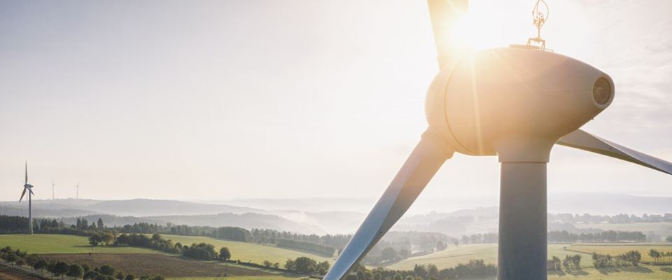 Turbine overlooking a wind energy farm