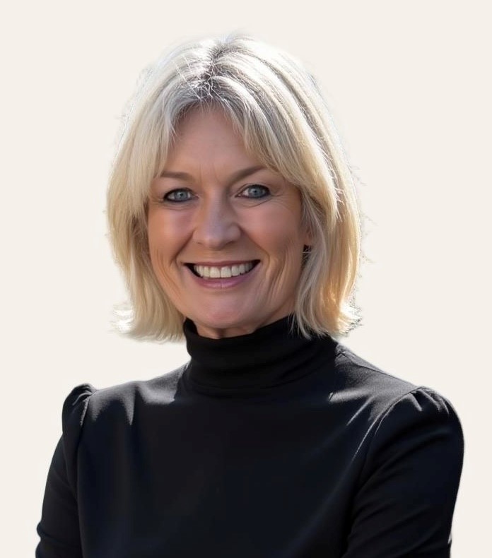 Portrait of Julianna Forsyth wearing a black turtleneck, with shoulder-length blonde hair against a light background